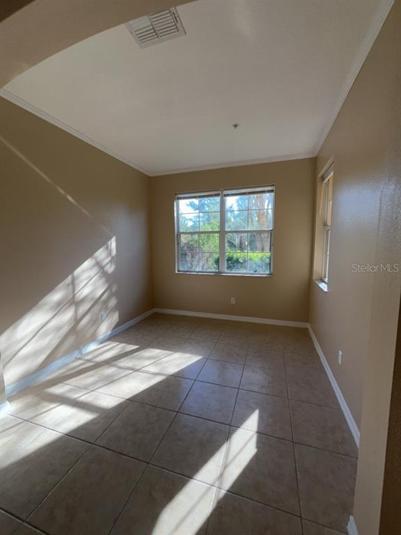 839 Assembly Court Reunion, FL 34747 - Photo 13 of 16 a view of an empty room and window