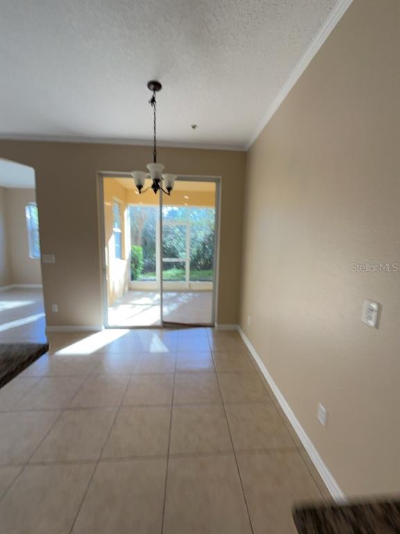 839 Assembly Court Reunion, FL 34747 - Photo 4 of 16 a view of an empty room with a window