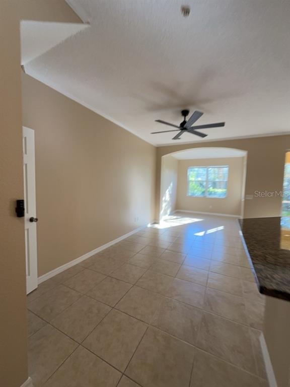 839 Assembly Court Reunion, FL 34747 - Photo 5 of 16 an empty room with windows and entrance