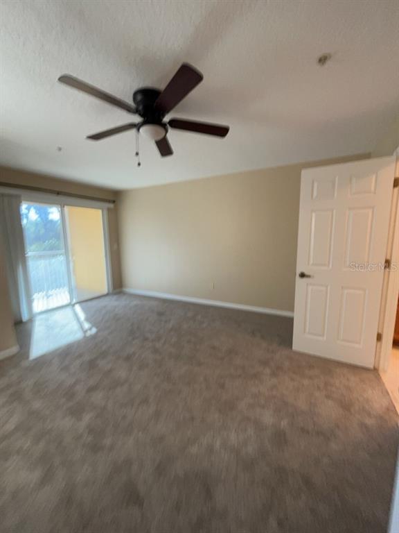 839 Assembly Court Reunion, FL 34747 - Photo 9 of 16 a view of an empty room with a window