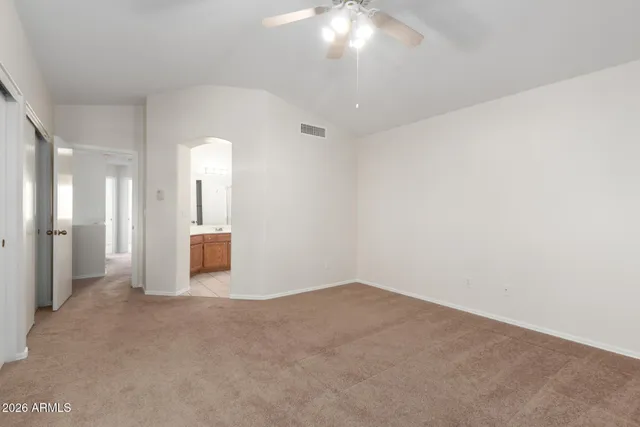 a view of a room with a hallway