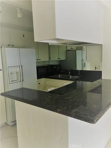 a view of a room with an empty space