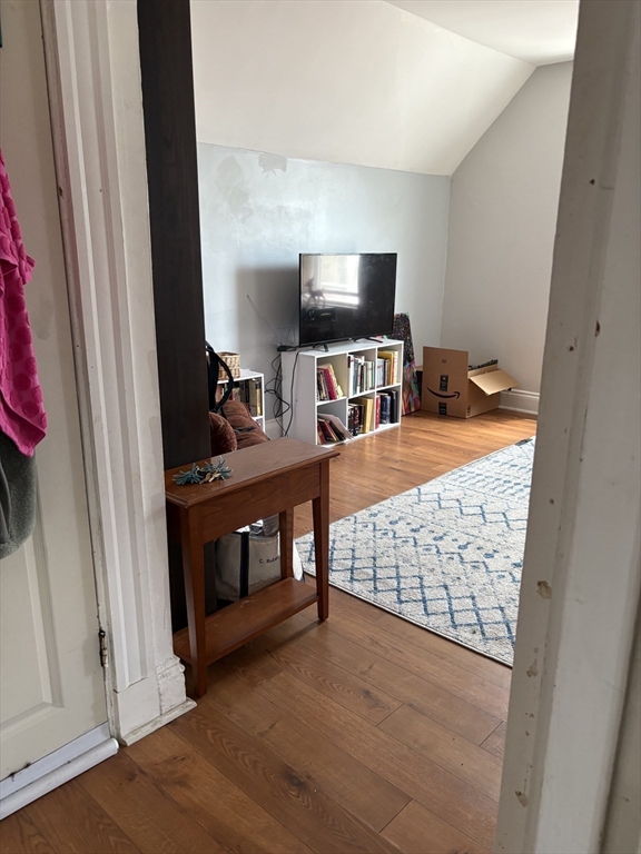 19 Wolcott Street, Unit 3 Boston, MA 02121 - Photo 7 of 17 a view of an empty room with furniture and window