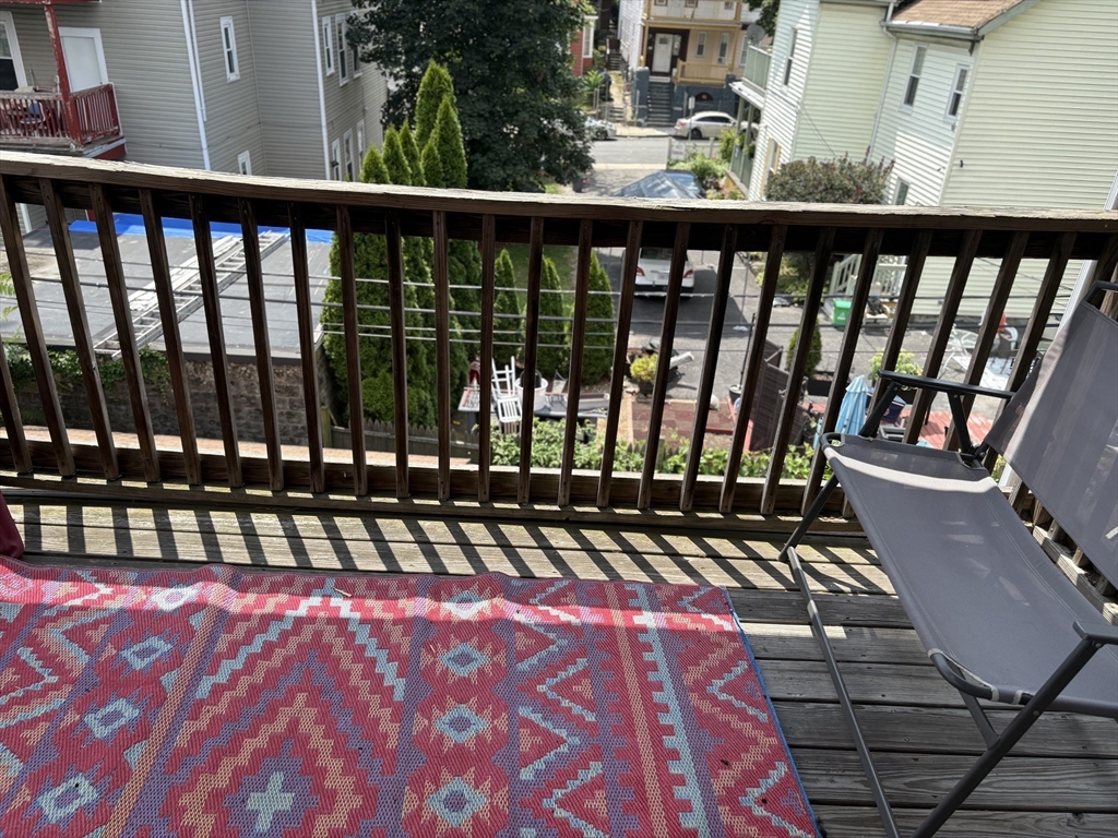 19 Wolcott Street, Unit 3 Boston, MA 02121 - Photo 10 of 17 a view of a balcony