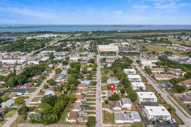 an aerial view of residential building with parking space