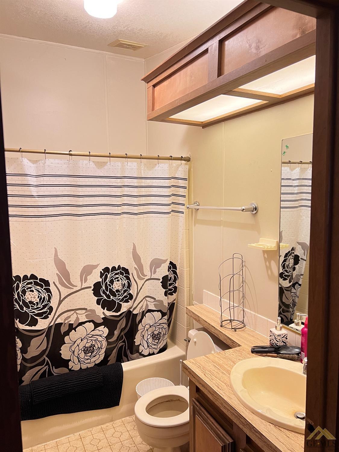 Undisclosed Address Caliente, CA 93518 - Photo 16 of 54 a bathroom with a sink and a mirror