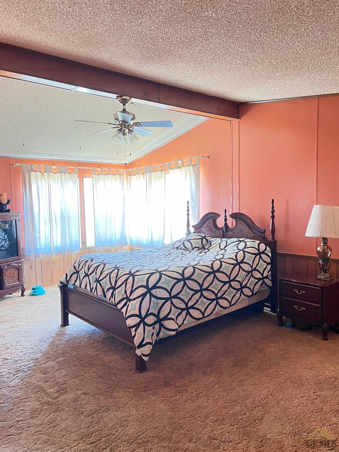 Undisclosed Address Caliente, CA 93518 - Photo 17 of 54 a bed sitting in a bedroom next to a window