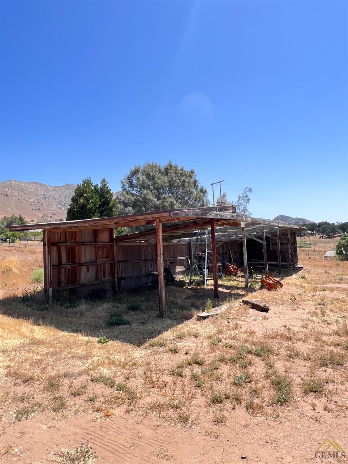 Undisclosed Address Caliente, CA 93518 - Photo 26 of 54 a view of a house with wooden fence