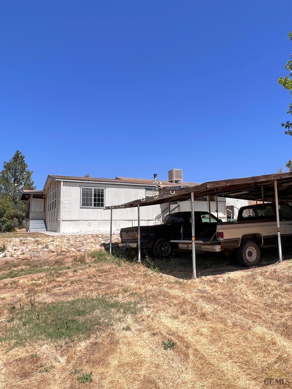 Undisclosed Address Caliente, CA 93518 - Photo 34 of 54 a view of a car parked in the yard