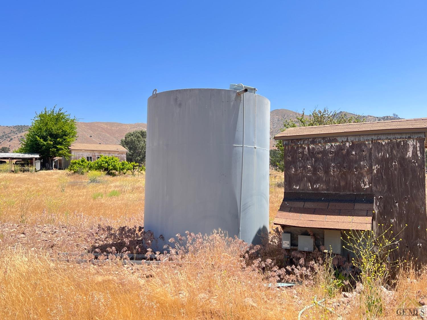 Undisclosed Address Caliente, CA 93518 - Photo 38 of 54 a view of a bench in front of a house
