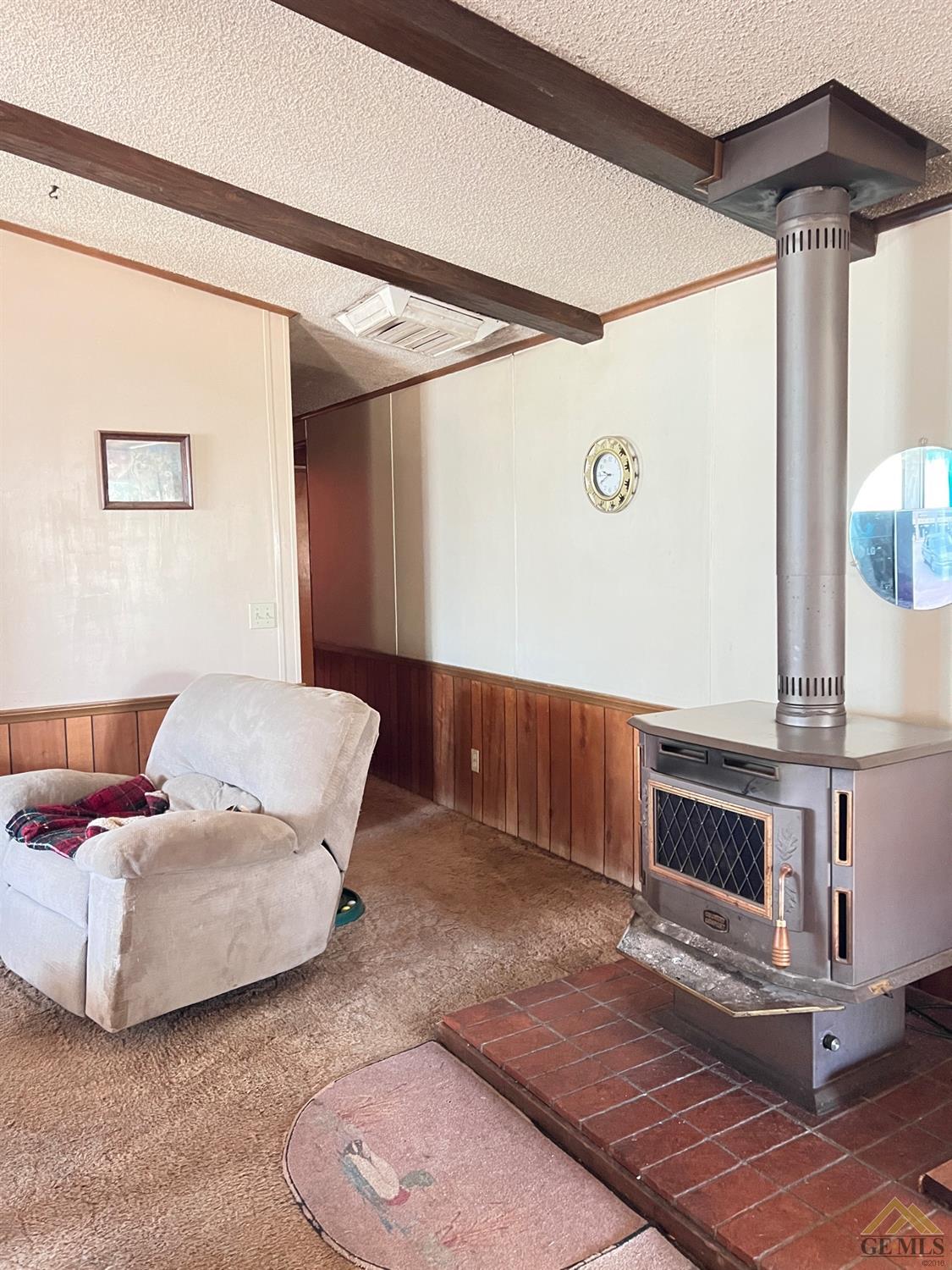 Undisclosed Address Caliente, CA 93518 - Photo 9 of 54 a living room with furniture and a fireplace