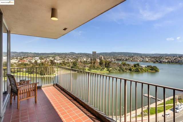 a view of a balcony with furniture
