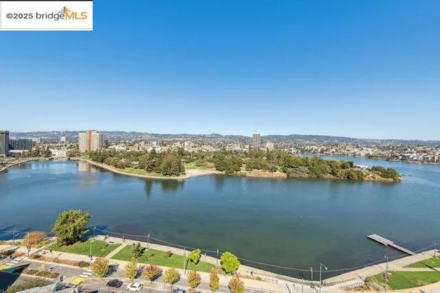 a view of a terrace with couches and sky view