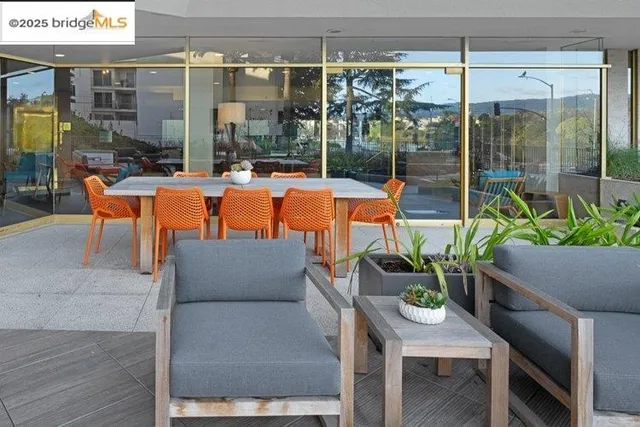 a view of a building with a garden and plants