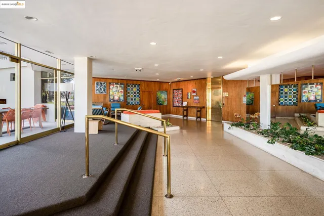 a very nice looking living room with a large window