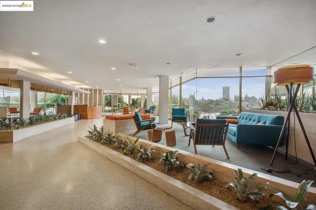 a view of a lake with boats and trees in the background