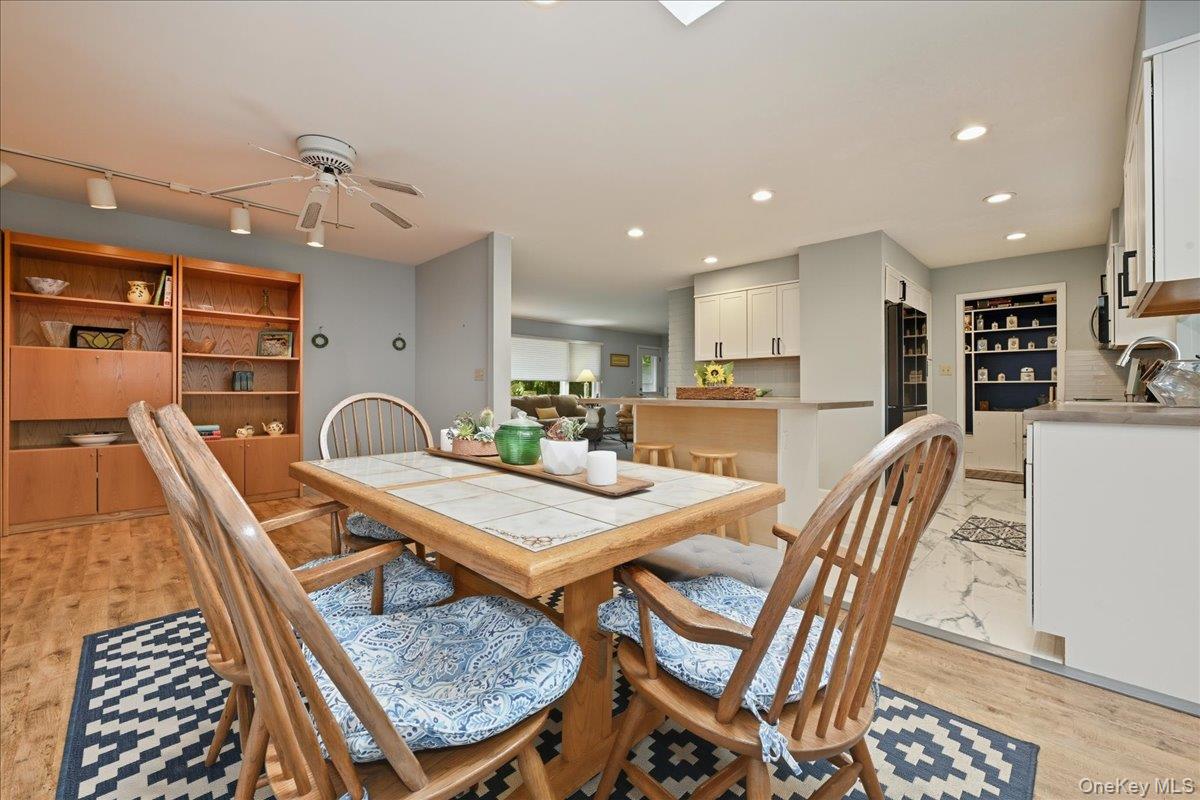 16 Ridge Drive East Roslyn, NY 11576 - Photo 14 of 40 a view of a dining room with furniture