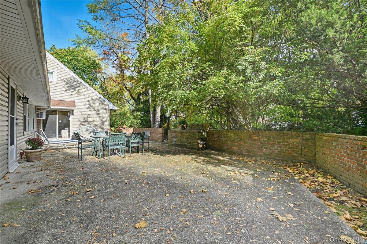 16 Ridge Drive East Roslyn, NY 11576 - Photo 35 of 40 a view of a outdoor space with lounge chair