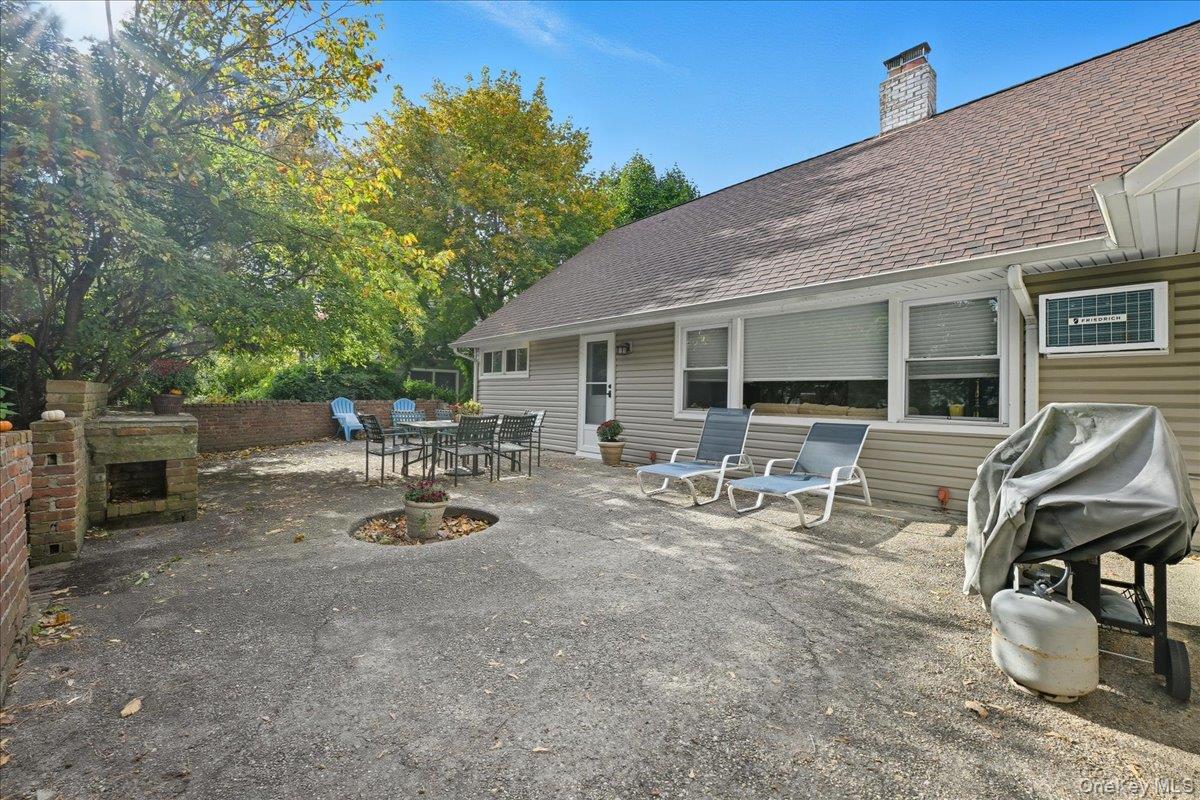 16 Ridge Drive East Roslyn, NY 11576 - Photo 39 of 40 a view of a outdoor space with a sitting space