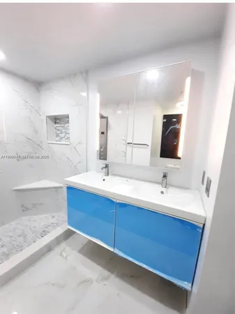 a bathroom with a sink and a bathtub