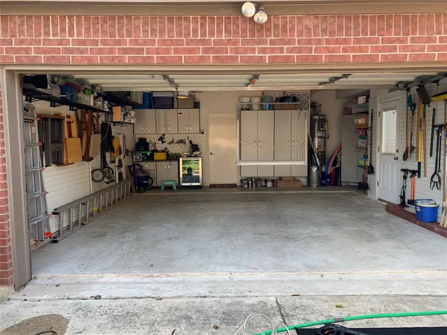 a view of a house with backyard and porch