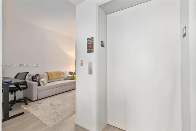 a living room with furniture and a couch