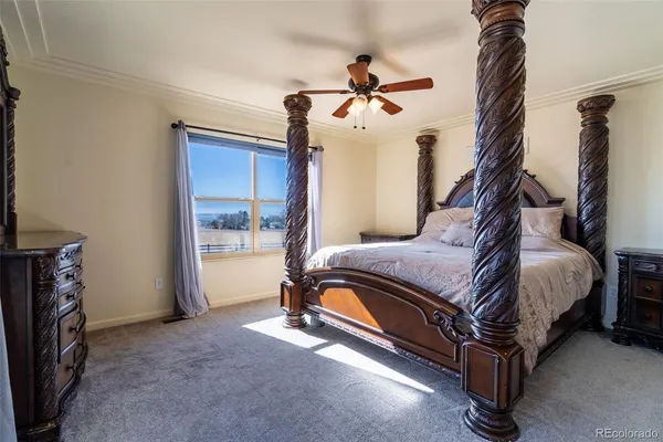 a bedroom with a bed dresser and a window