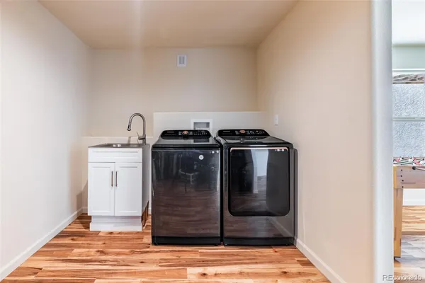 a utility room with washer and dryer