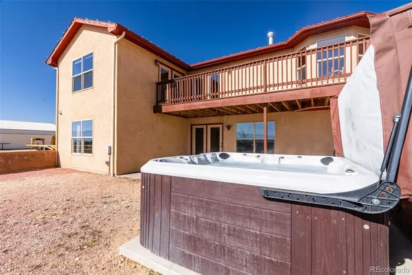 a front view of a house with a tub