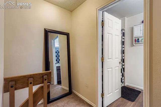 a bedroom with a bed and flat screen tv