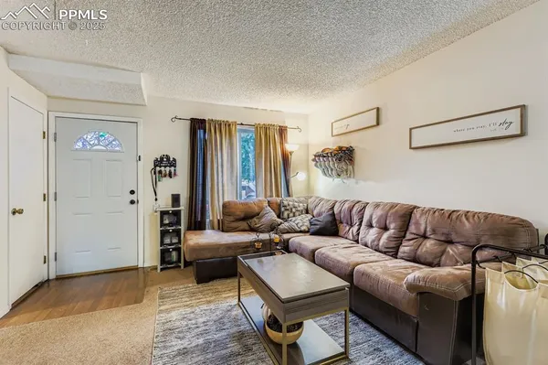 a living room with furniture and a couch