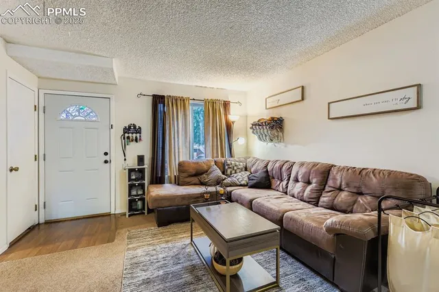 a living room with furniture and a couch