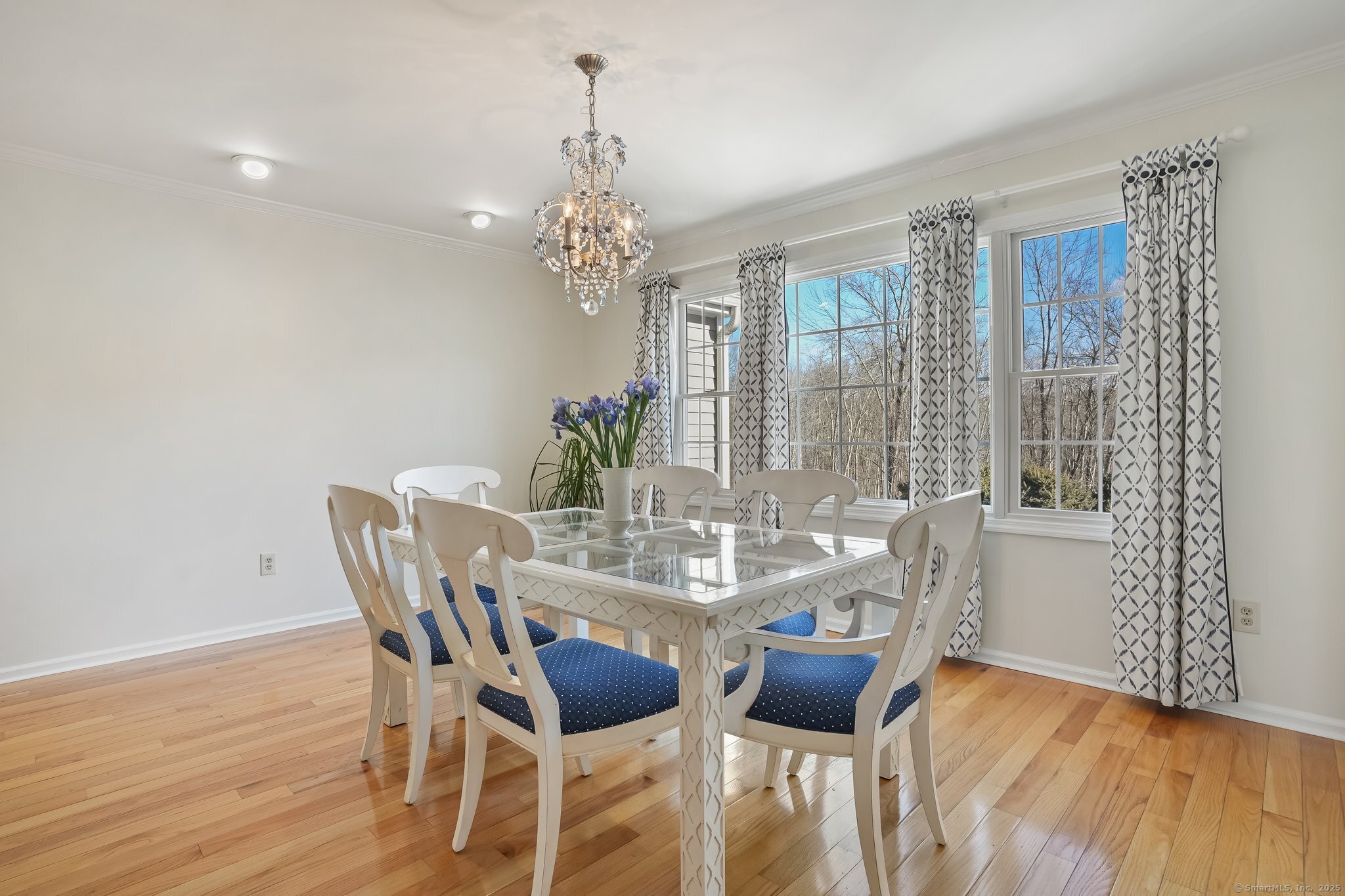 120 Prospect Street, Unit 48 Ridgefield, CT 06877 - Photo 20 of 38 a view of a dining room with furniture window and wooden floor