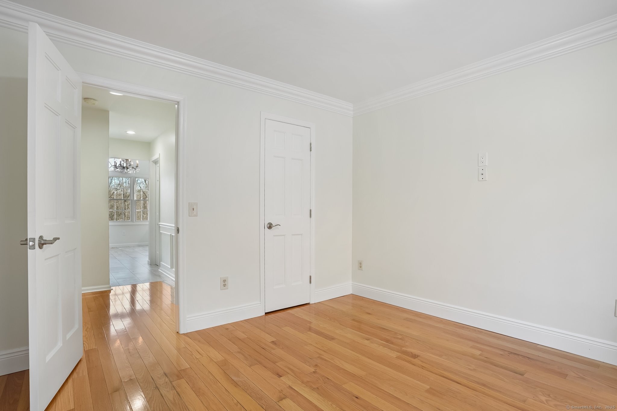120 Prospect Street, Unit 48 Ridgefield, CT 06877 - Photo 22 of 38 wooden floor in an empty room