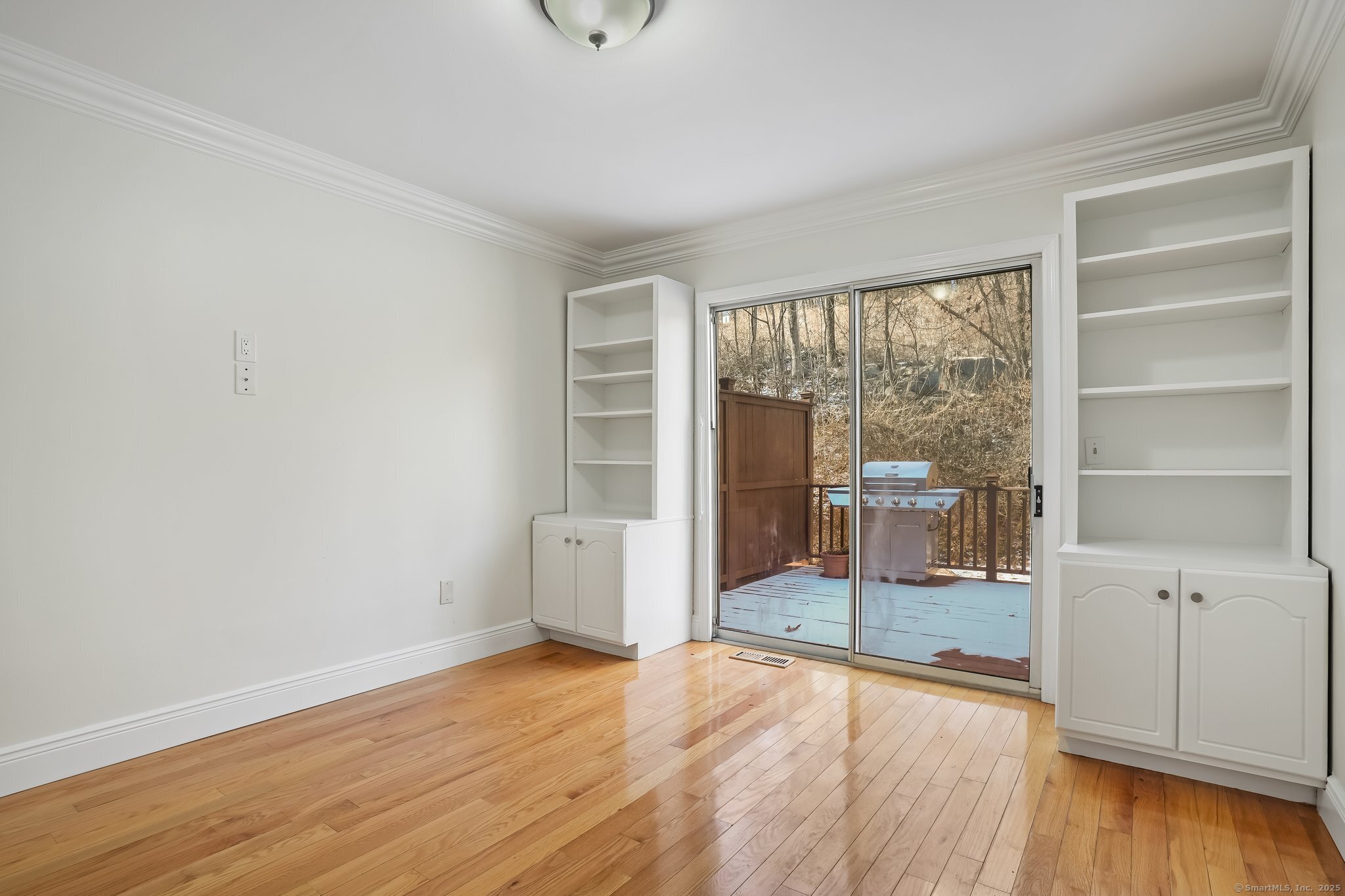 120 Prospect Street, Unit 48 Ridgefield, CT 06877 - Photo 24 of 38 wooden floor in an empty room with a window