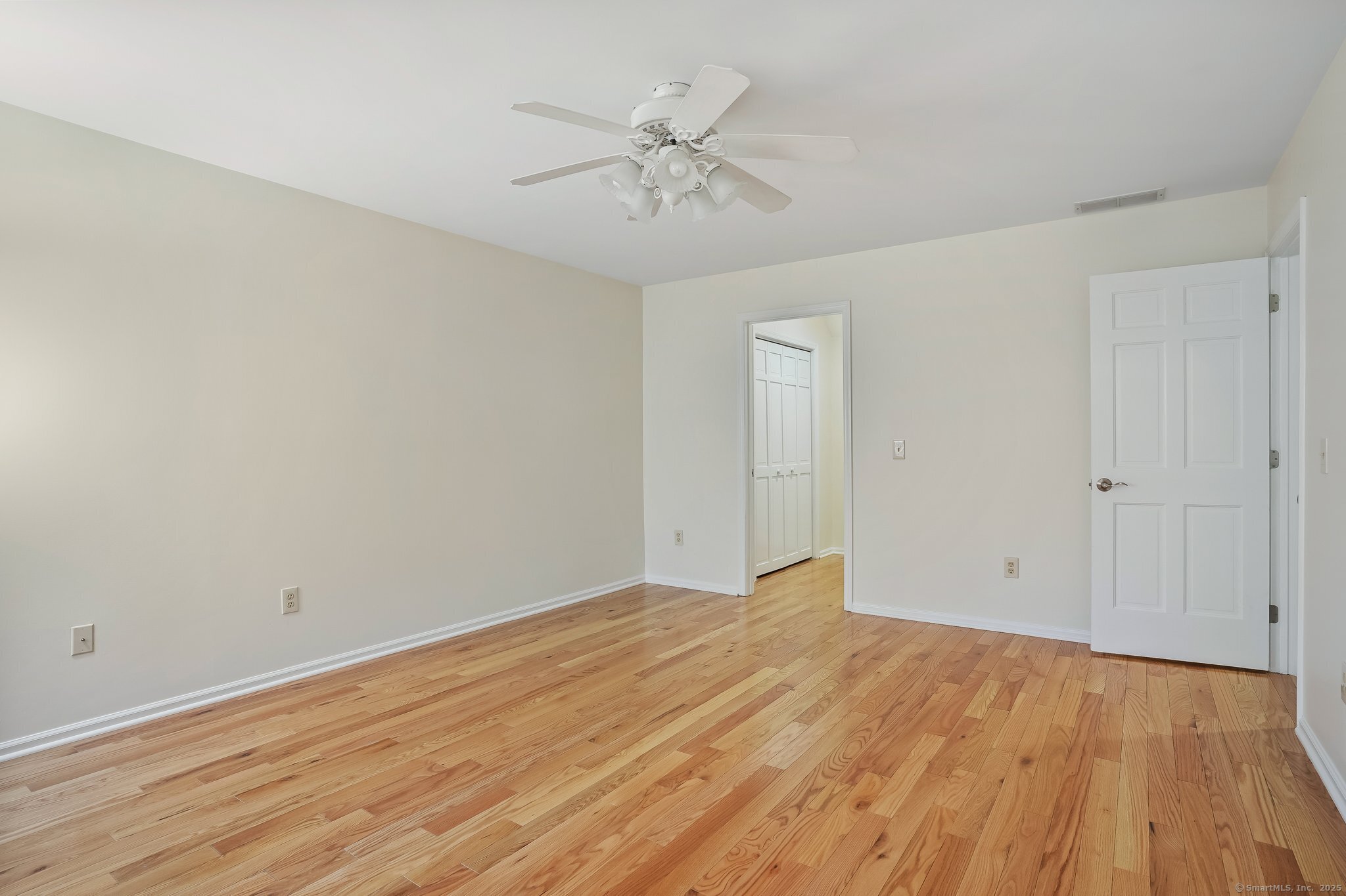 120 Prospect Street, Unit 48 Ridgefield, CT 06877 - Photo 29 of 38 wooden floor in an empty room