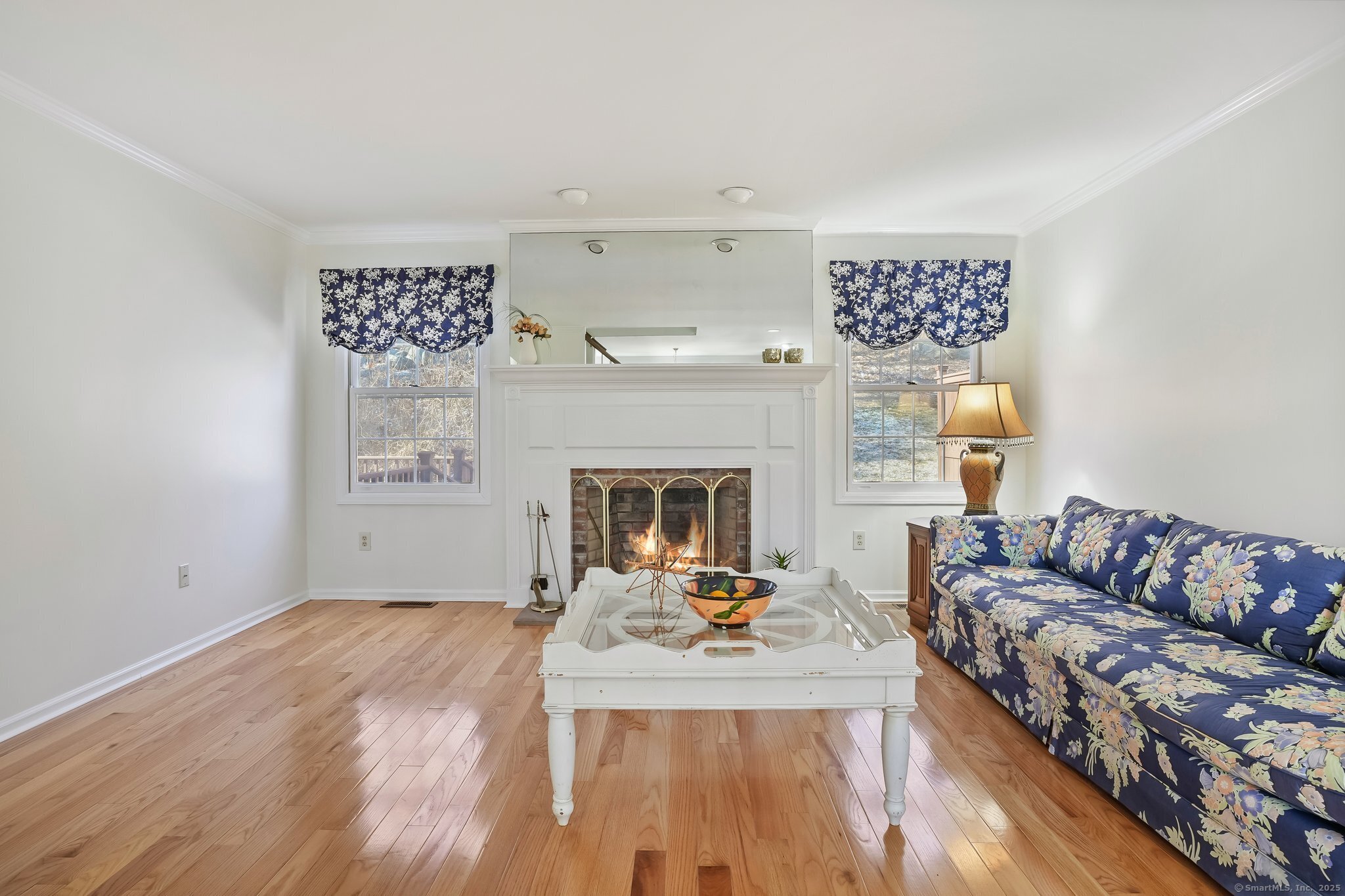 120 Prospect Street, Unit 48 Ridgefield, CT 06877 - Photo 3 of 38 a living room with furniture and a fireplace