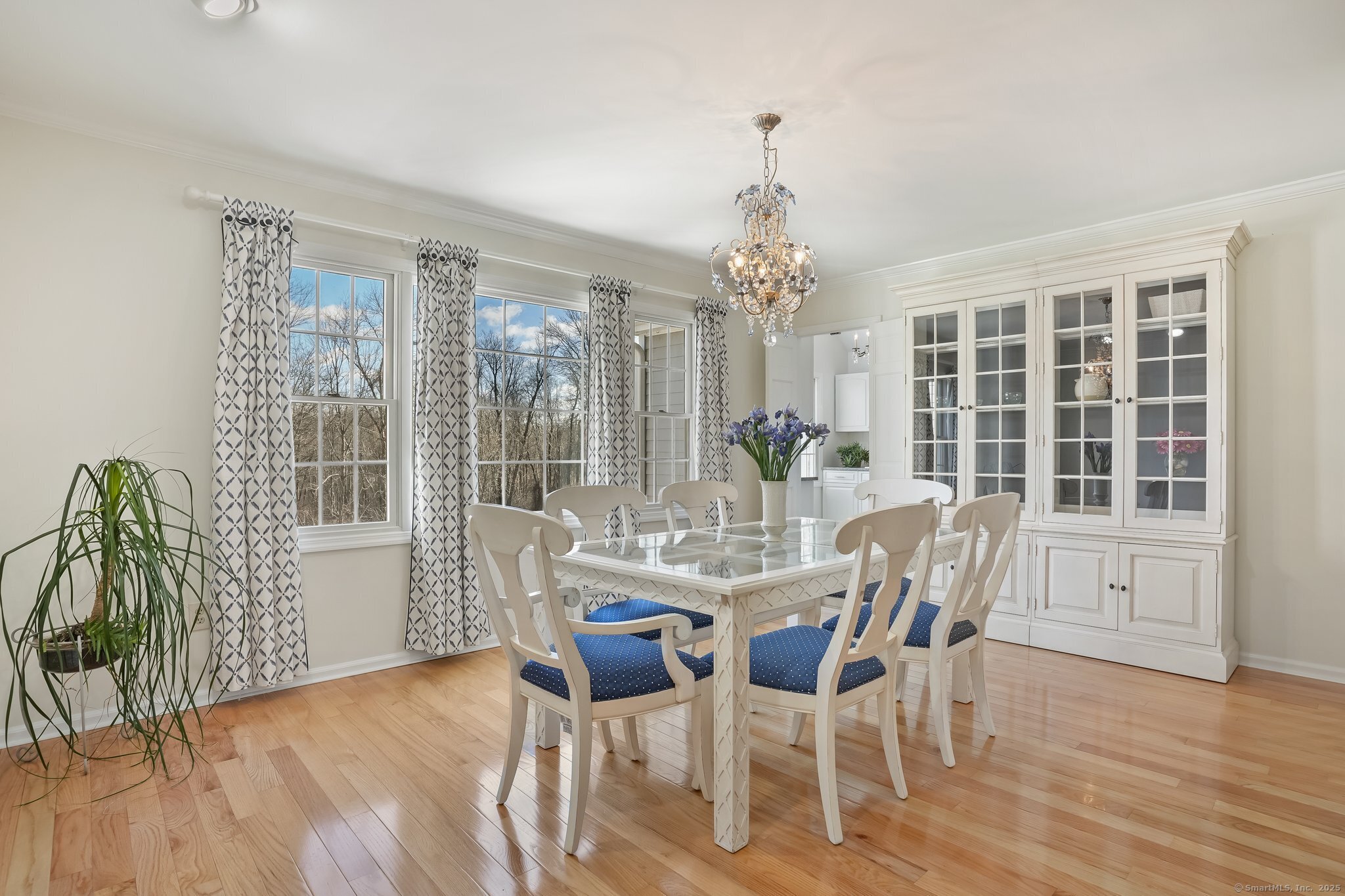120 Prospect Street, Unit 48 Ridgefield, CT 06877 - Photo 4 of 38 a view of a dining room with furniture window and wooden floor