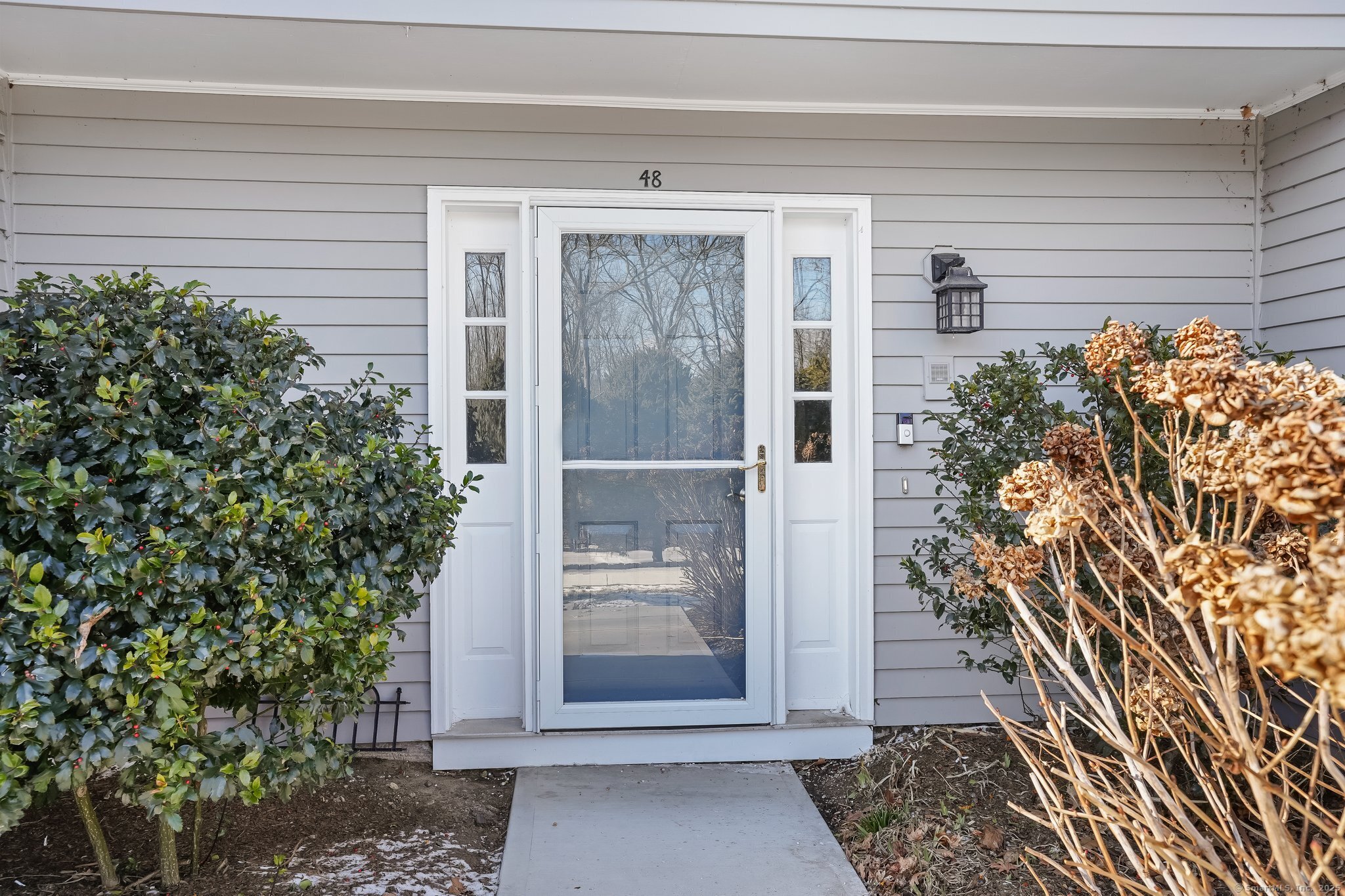 120 Prospect Street, Unit 48 Ridgefield, CT 06877 - Photo 6 of 38 a view of a glass door with glass door