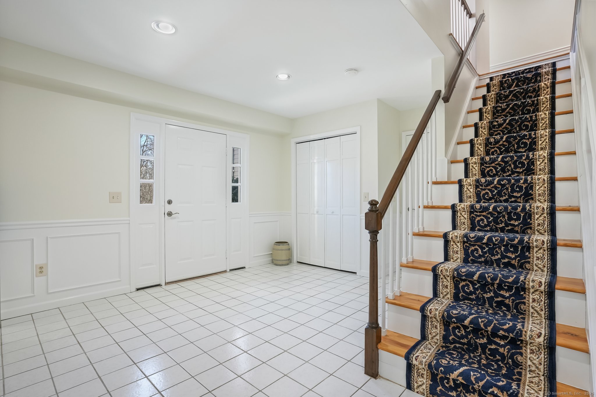 120 Prospect Street, Unit 48 Ridgefield, CT 06877 - Photo 10 of 38 a view of an entryway with staircase