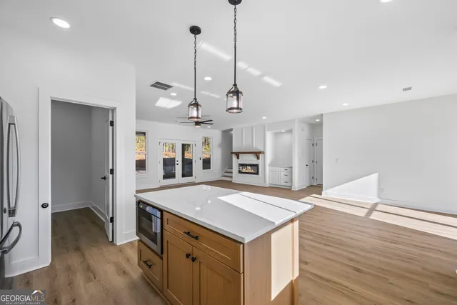 a view of an empty room with a window