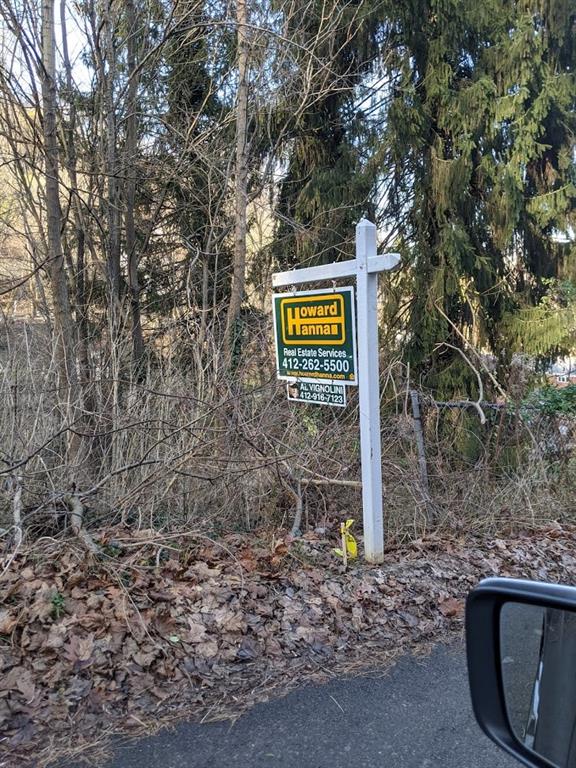 0 Riverview Avenue McKees Rocks, PA 15136 - Photo 1 of 12 a sign board with tall trees