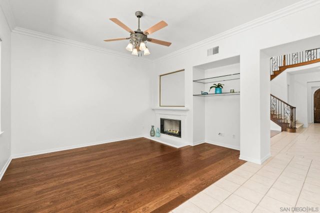 a view of a kitchen with wooden floor