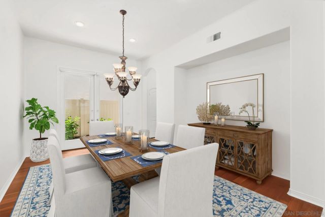 a kitchen with stainless steel appliances a refrigerator sink and stove