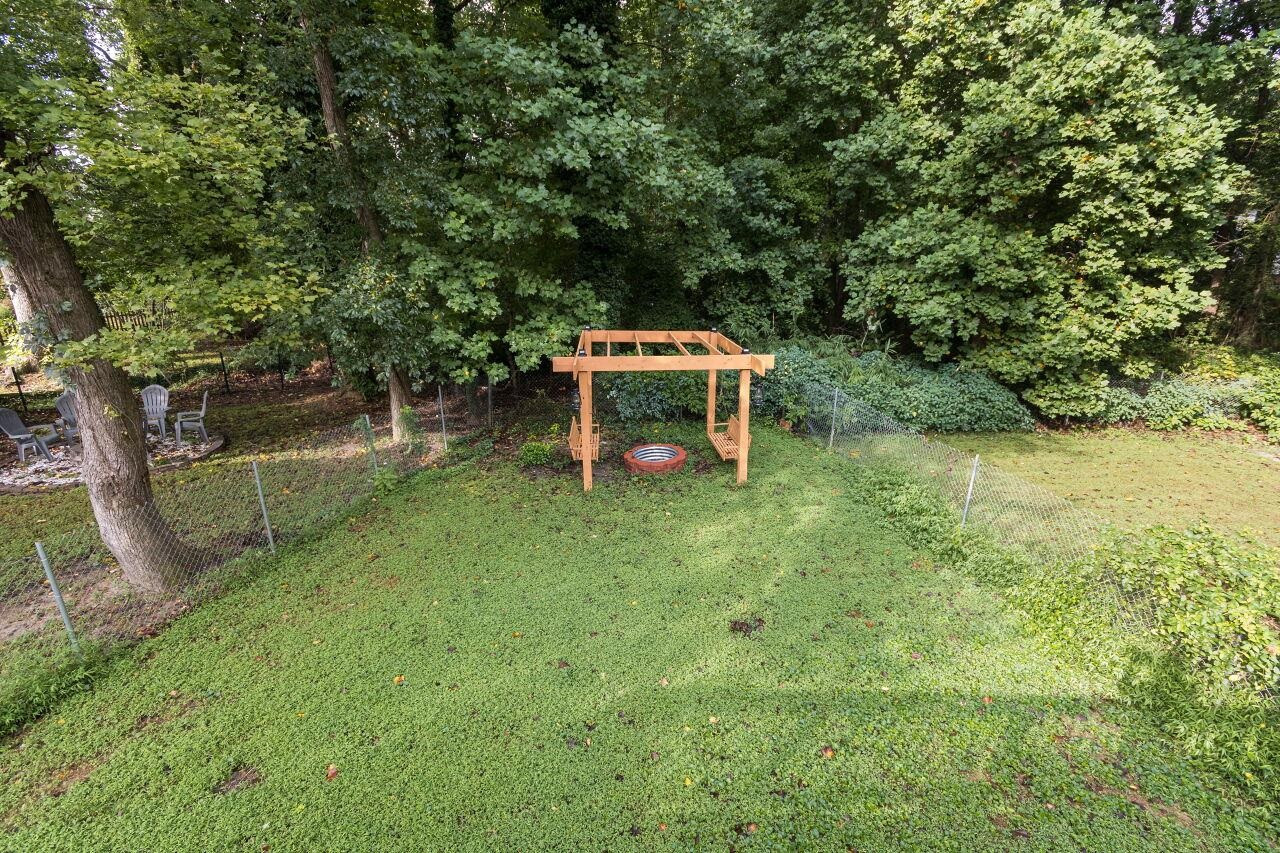 7305 Wilderness Road Raleigh, NC 27613 - Photo 24 of 27 Fenced Yard