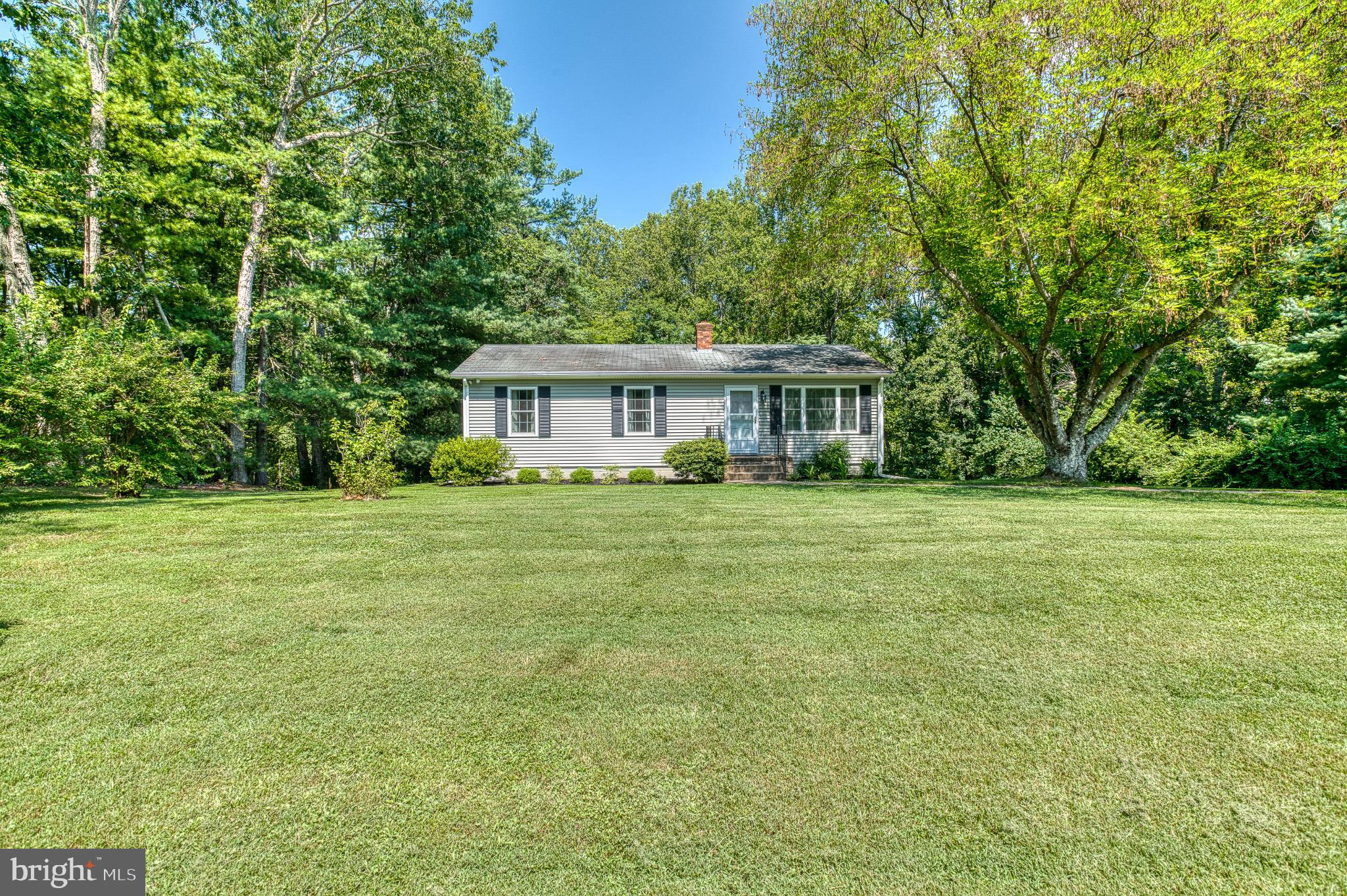 13192 Scotts Mill Road Culpeper, VA 22701 - Photo 1 of 1 Charming home nestled in lush greenery.