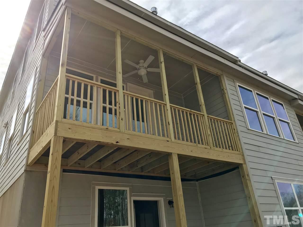 2516 Rambling Creek Road, Unit 28 Apex, NC 27523 - Photo 20 of 29 Outside view of the screened porch.