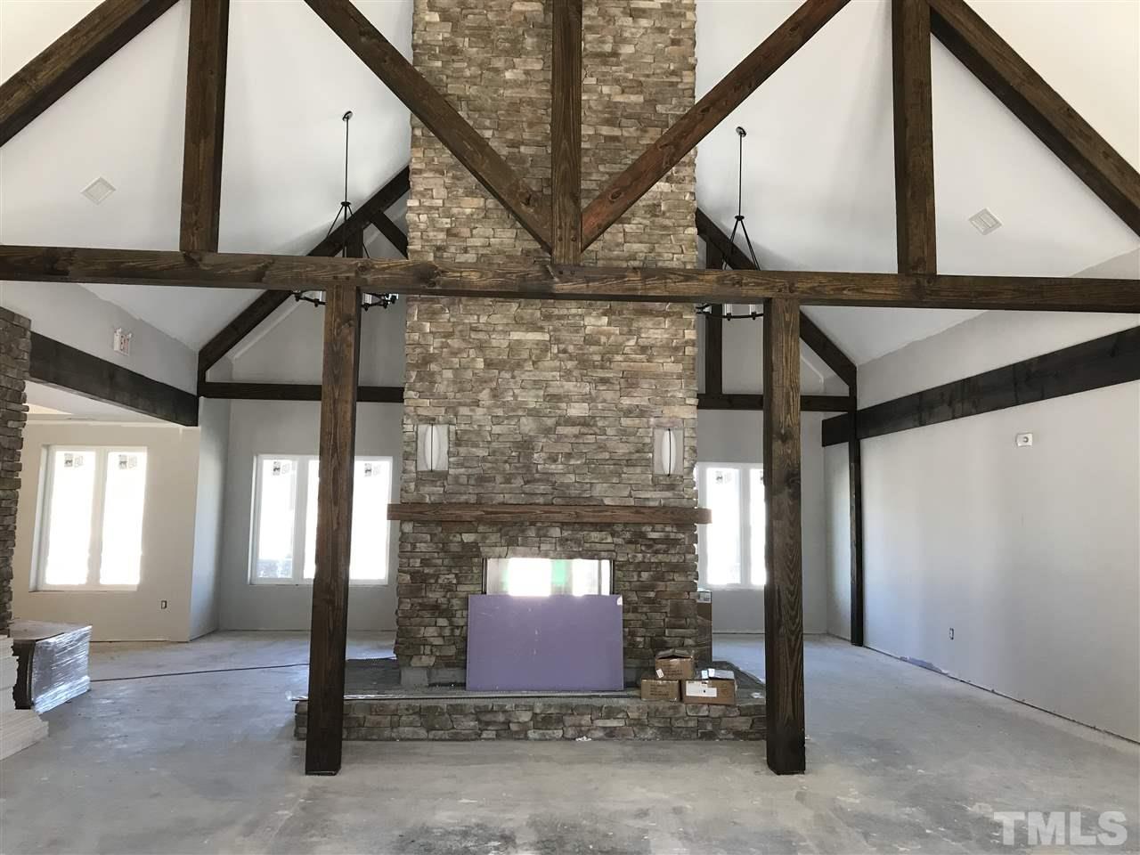 2516 Rambling Creek Road, Unit 28 Apex, NC 27523 - Photo 23 of 29 Large gathering area with double sided fireplace.