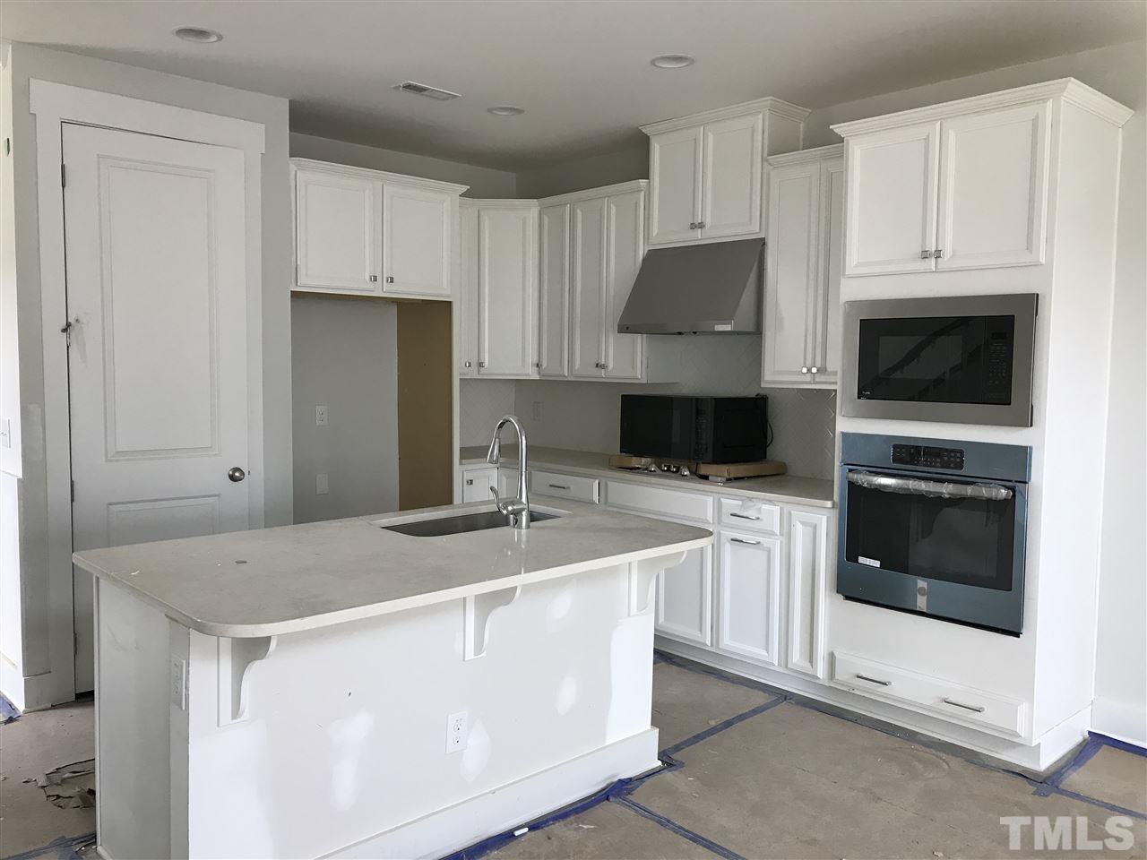 Gourmet kitchen with quartz counter tops.
