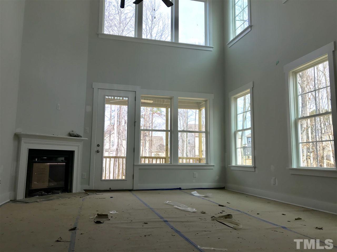 2 Story family room with several windows for great natural light.